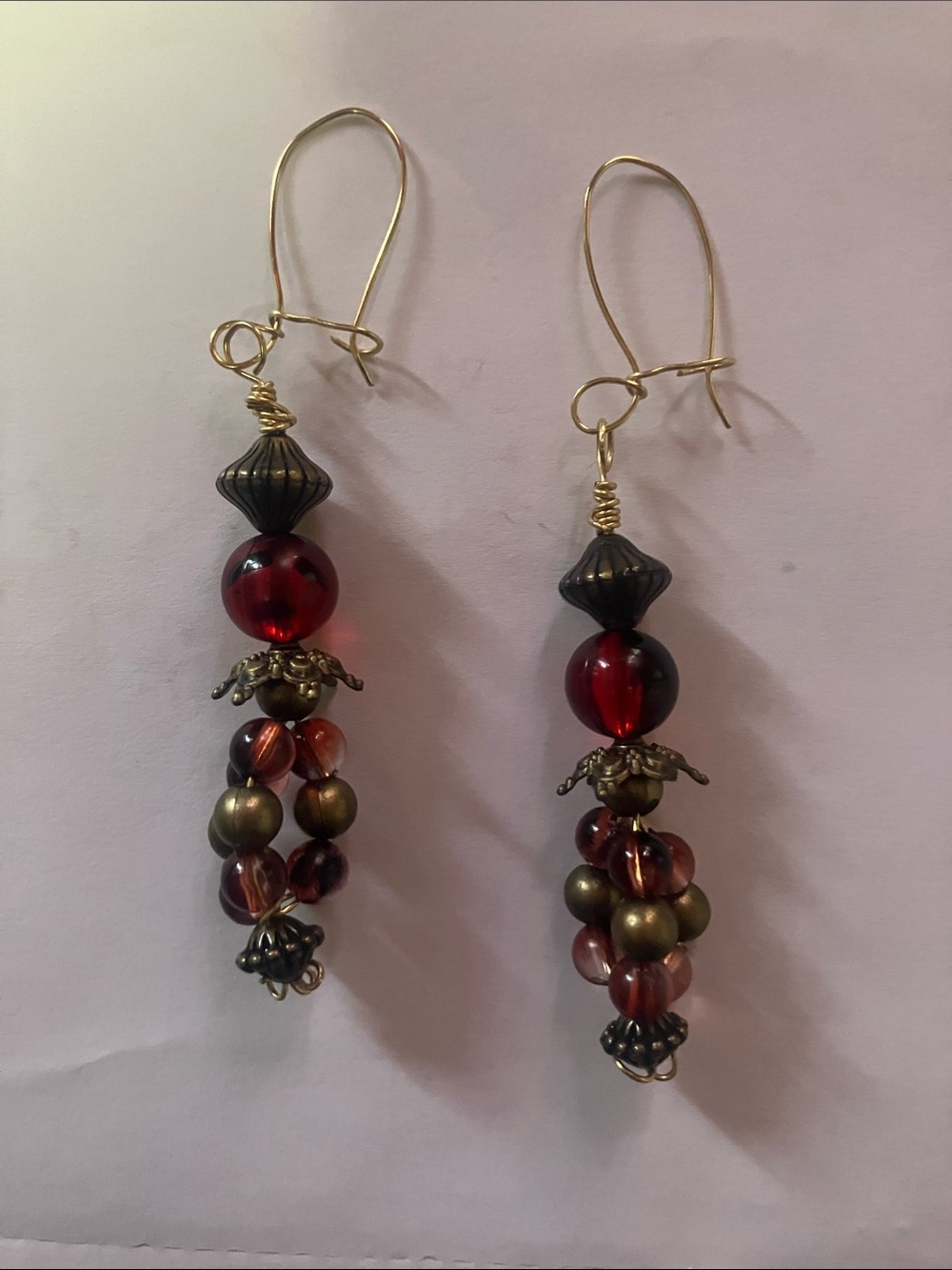 Handcrafted upcycled vintage long wire pierced red and bronze bead earrings